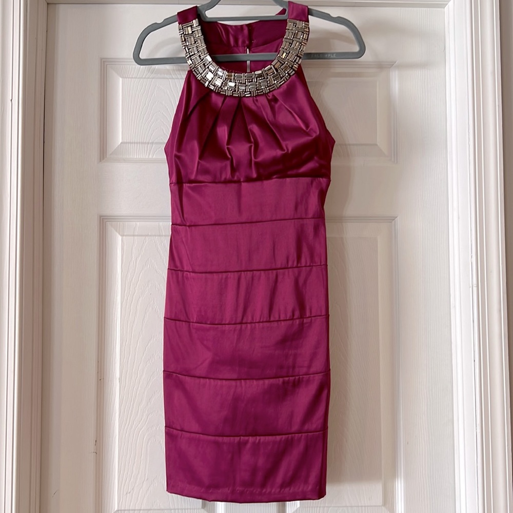 Maroon fitted cocktail dress with high neckline and jeweled detailing. Size 5/6